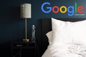 camera di hotel con logo google hotels center
